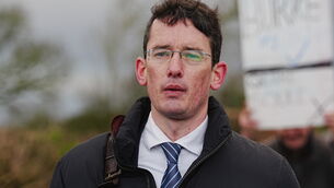 <p>Enoch Burke outside Wilson’s Hospital School in Co Westmeath having been refused entry (PA)</p>