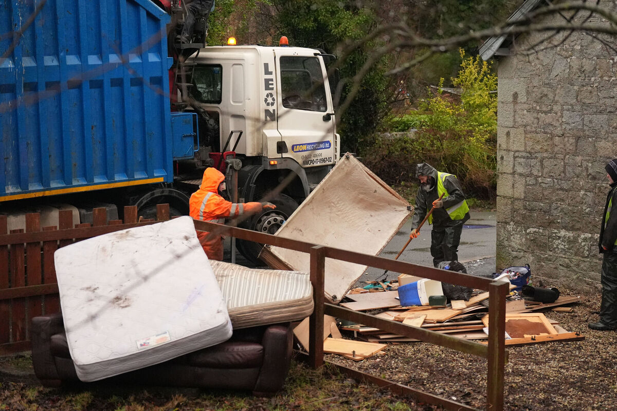 County Wicklow council workers help local residents clean up storm damaged properties in Aughrim, County Wicklow. Picture date: Tuesday, February 3, 2026. Picture: Niall Carson/PA Wire