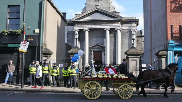 <p>The funeral of David Byrne, who was shot dead in the Regency Hotel in February 2016: The funeral cortege boasted two hearses and 10 stretched limousines, and three horse-drawn carts carrying floral tributes, Picture: Colin Keegan/Collins</p>