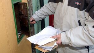 <p>A postal worker collecting letters.  A protest will take place at the Dáil next Tuesday at delays in paying pension increases to more than 20,000 pensioners who worked at An Post and Eir. Picture: Dan Linehan</p>