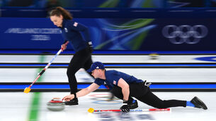 <p>Great Britain's Bruce Mouat (right) in action as Jennifer Dodds looks on during the Curling Mixed Doubles, Round Robin Session against Norway, at the Cortina Curling Olympic Stadium, Italy. Picture:  Andrew Milligan/PA</p>