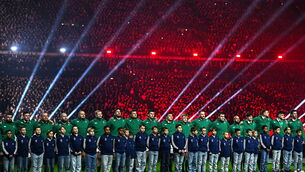 <p>KICK-OFF: Ireland players during the national anthem before the Guinness 6 Nations Rugby Championship match between France and Ireland at Stade de France in Paris, France. Photo by Ramsey Cardy/Sportsfile</p>