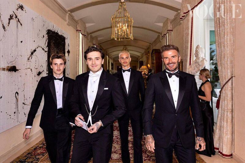 Brooklyn Beckham caused fierce kerfuffle when he shared goss and pictures from his wedding day on Instagram. Here he is with his dad, David Beckham. Denis Lehane is not in this photo, and is possibly just behind that curtain over there on the right. Picture: Brooklyn Beckham/Instagram/Vogue