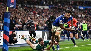 <p>Théo Attissogbe of France beats the tackle from Jack Crowley of Ireland on his way to scoring his side's fifth try. Pic: Seb Daly/Sportsfile</p>