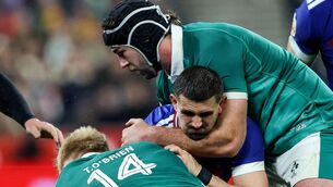 <p>ARM WRESTLE: France's Thomas Ramos is tackled by Ireland's Caelan Doris and Tommy O'Brien. Pic: INPHO/Ben Brady</p>