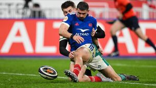 <p>SPECIAL: France full back Thomas Ramos clears the ball on the try line ahead of Sam Prendergast at Stade de France in Paris. Pic: Brendan Moran/Sportsfile</p>