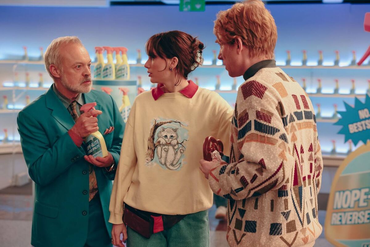Graham Norton, Taylor Swift and Domhnall Gleeson in the Opalite music video.
