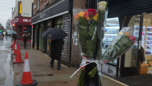 <p>Flowers left at the scene of a bus crash on the pedestrianised North Earl Street in Dublin city centre. Picture: Brian Lawless/PA Wire</p>