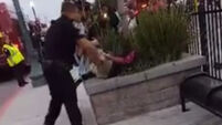Watch: Nine cops arrest young black teen for jaywalking in California