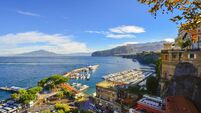 View of the Port and historic waterfront old town area of Sorrento, Italy, from a cliff viewpoint above the city and the Gulf of