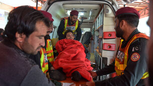 The injured were taken to hospiital (MA Sheikh/AP)