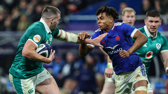 <p>France's Theo Attissogbe attempts to tackle Ireland's Stuart McCloskey. Pic: Ben Brady/Inpho</p>