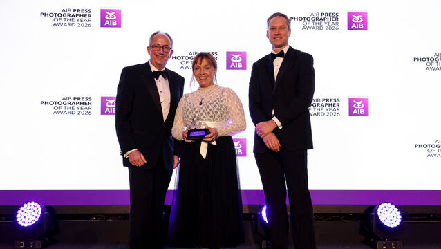 <p>At the AIB Press Photographer of the Year Awards were (left to right) Press Photographers Ireland president David Branigan, Irish Examiner photographer Chani Anderson (centre) who won 1st place in the Reportage category, and AIB head of external communications Will Goodbody. Picture: INPHO/Tom O’Hanlon</p>
