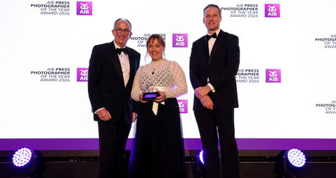 David Branigan and Chani Anderson receiving the trophy for 1st place in the Reportage category from Will Goodbody 6/2/2026
