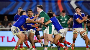 <p>ames O'Leary of Ireland is tackled by Melvyn Rates and Luka Keletaona of France during the U20 Six Nations Rugby Championship match between France and Ireland at Stade Amie Giral in Perpignan, France. Photo by Brendan Moran/Sportsfile</p>