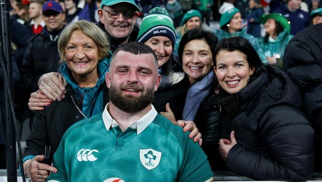 <p>FAMILY PORTRAIT: Ireland's Michael Milne with friends and family after the match. Pic: INPHO/Ben Brady</p>