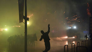 Demonstrators clash with police (Claudio Furlan/LaPresse via AP)