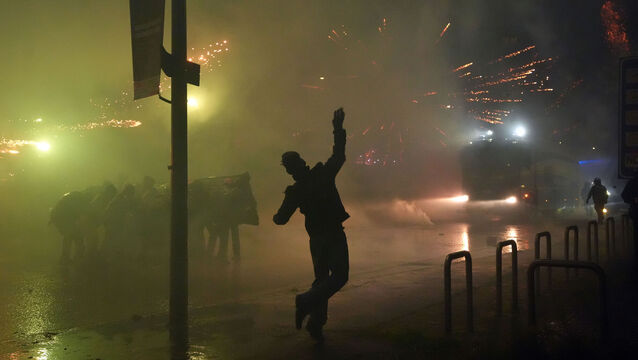 <p>Demonstrators clash with police (Claudio Furlan/LaPresse via AP)</p>
