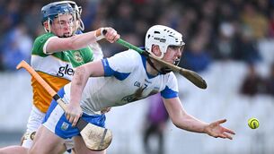 <p>DEISE DELIGHT: Shane Bennett is tackled by Ter Guinan during the Allianz Hurling League Division 1A match. Pic: Shauna Clinton/Sportsfile</p>