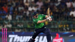 <p>Lorcan Tucker of Ireland bats during the ICC Men's T20 World Cup clash with Sri Lanka at R. Premadasa Stadium Photo by Matthew Lewis-ICC/ICC via Getty Images</p>