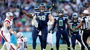 <p>Seattle Seahawks Rylie Mills celebrates after sacking New England Patriots Drake Maye (Scott Strazzante/San Francisco Chronicle/AP)</p>