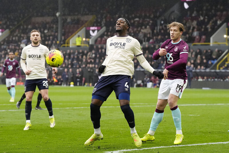 West Ham United's Axel Disasi and Burnley's Zian Flemming battle for the ball. Pic: Nick Potts/PA Wire.