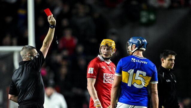 <p>MAKE MINE A DOUBLE: Referee Liam Gordon issues a red card to Shane Barrett and Jason Forde. Pic: Ray McManus/Sportsfile.</p>