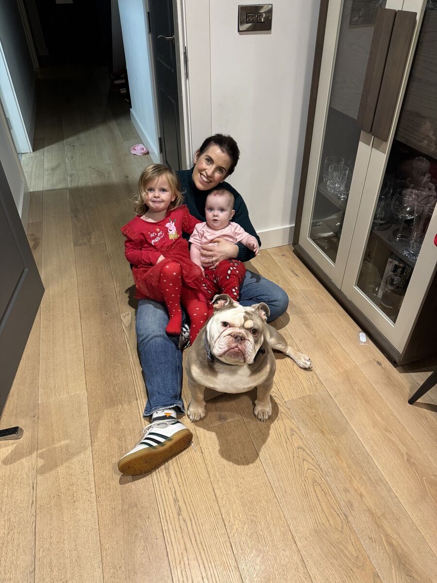 Jennifer Allen with daughters Olivia, left, and Eloise, and family dog Islay. 