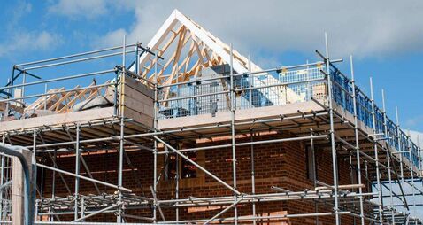 Loading platform made of scaffold system on housing development construction site