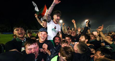 Sean Maguire celebrates winning the First Division and getting promoted to the Premier Division with fans 6/9/2024