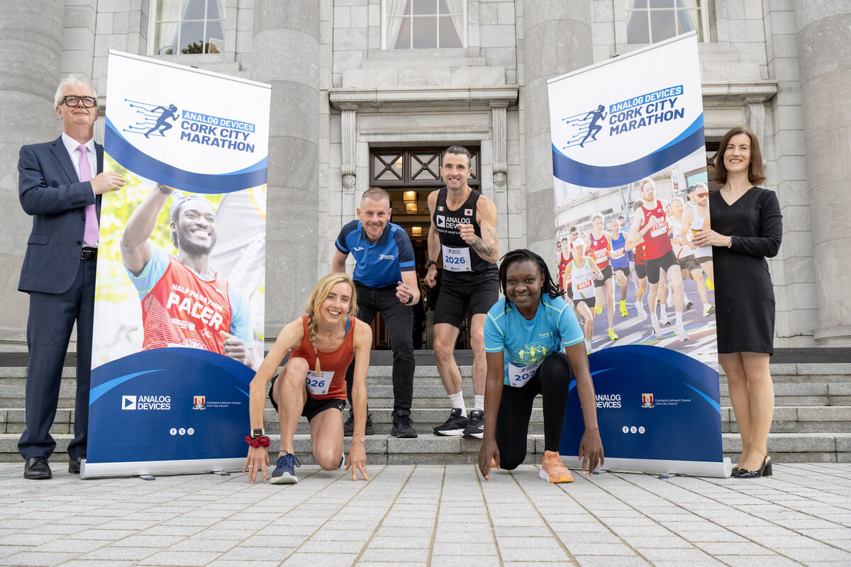 Promoting the 2026 Analog Devices Cork City Marathon  are: are marathon runners Evelyn Twomey (2025 ladies winner), John Kinsella, Back 2 Boston Project, Busie Mhlophe. Included are Meabh Shine of Analog Devices and Joe Barry, vice-president,  Analog Devices. Also included is Eamon Hayes, Race Director. Photo: Brian Lougheed
