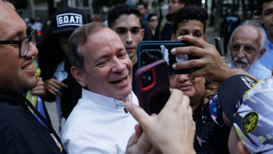 Opposition politician Juan Pablo Guanipa records a video message to supporters after his release from prison in Caracas on Sunday (Cristian Hernandez/AP)