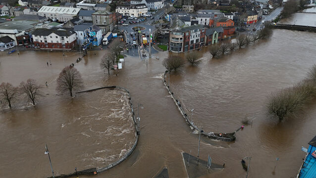 <p>The River Slaney bursts its banks in Enniscorthy, Co Wexford on January 27, leaving thousands without power. File picture: PA</p>
