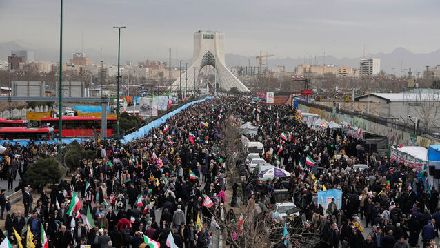 People attend an annual rally marking the 1979 Islamic Revolution (Vahid Salemi/AP)