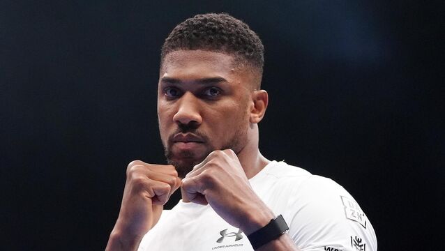 <p>Two-time world heavyweight champion Anthony Joshua was injured in a car crash in Nigeria, which killed close friends Sina Ghami and Latif ‘Latz’ Ayodele (Bradley Collyer/PA)</p>
