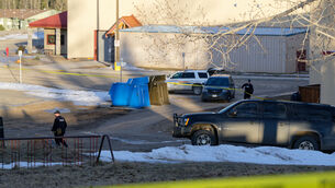 Police block an area near Tumbler Ridge Secondary School in Canada (Jesse Boily /The Canadian Press via AP)