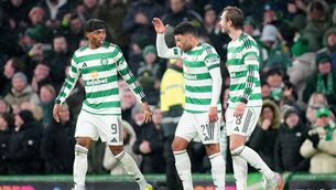 <p>Celtic's Alex Oxlade-Chamberlain (centre) celebrates. Pic: Jane Barlow/PA Wire.</p>