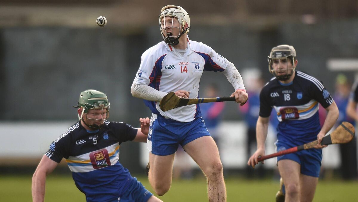 Cian Lynch of Mary Immaculate College Limerick in action against Colm Byrne of Dublin Institute of Technology during the Independent.ie HE GAA Fitzgibbon Cup Group A Round 3 match between Dublin Institute of Technology and Mary Immaculate College Limerick at Parnells GAA Club in Coolock, Dublin. Photo by Cody Glenn/Sportsfile