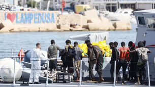 <p>Rescued migrants stand in a boat of the Italian finance police before disembarking at the port of the Sicilian island of Lampedusa, southern Italy, in 2023. File picture: Cecilia Fabiano/AP</p>