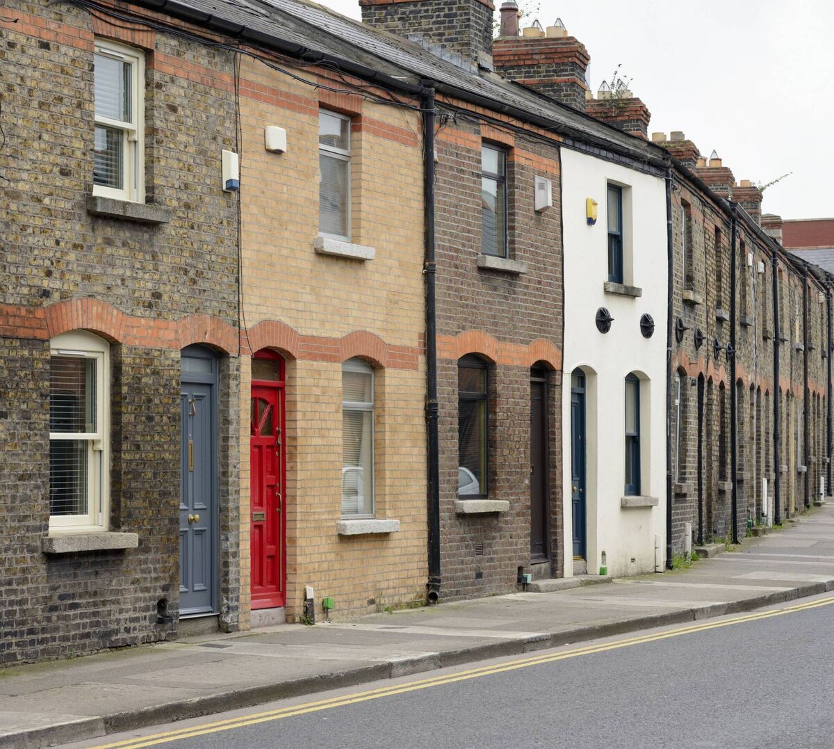 The rendering over one home puts a sad stutter in this period terrace.