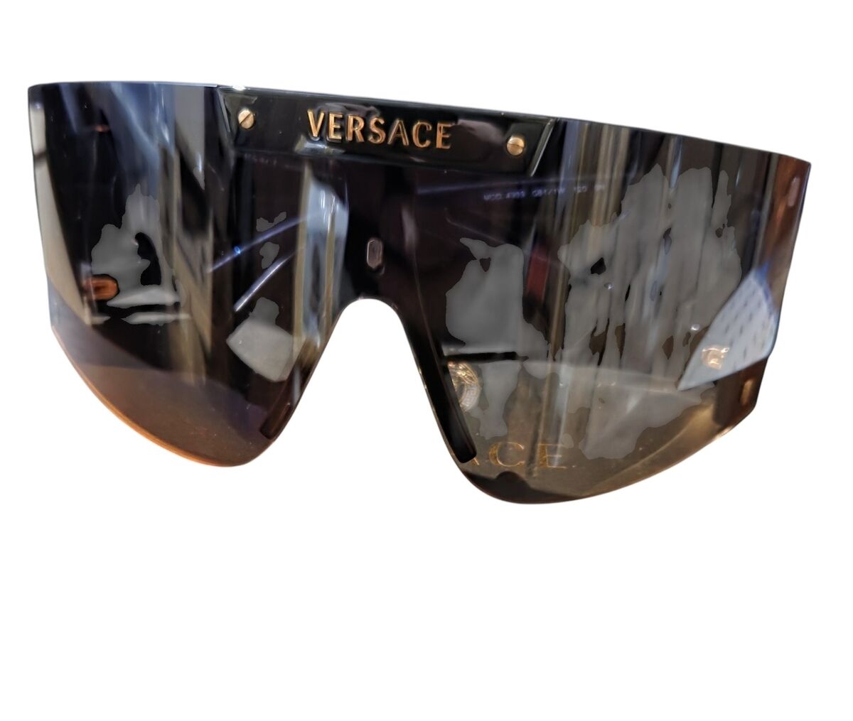 A boxed and cased pair of Versace sunglasses.