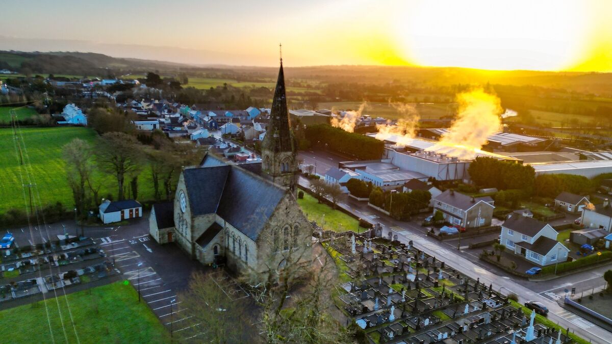The winter sun rises behind the Church of the Immaculate Conception in Ballineen and Enniskean, Cork. Picture Chani Anderson