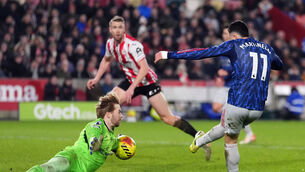 <p>MAKING HIMSELF BIG: Brentford goalkeeper Caoimhín Kelleher denies Arsenal's Gabriel Martinelli a late winner in Thursday's Premier League clash at the Gtech Community Stadium. Picture: Adam Davy/PA </p>