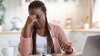 Eyes Strain. Overworked Black Freelancer Woman Tired After Using Laptop In Kitchen