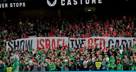 ans display a "Show Israel the red card" banner 6/9/2025