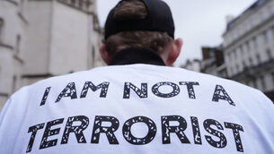 <p>A protester outside the High Court, central London, after the ruling in favour of Palestine Action's co-founder Huda Ammori's challenge over the ban of the organisation as a terror group. Picture: Jonathan Brady/PA</p> <p>A protester outside the High Court, central London, after the ruling in favour of Palestine Action's co-founder Huda Ammori's challenge over the ban of the organisation as a terror group. Picture: Jonathan Brady/PA</p>