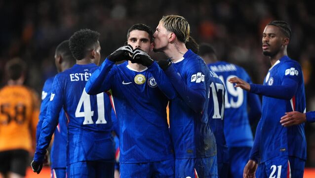 <p>Pedro Neto (left) scored a hat-trick for Chelsea at Hull. Pic: Mike Egerton/PA</p>