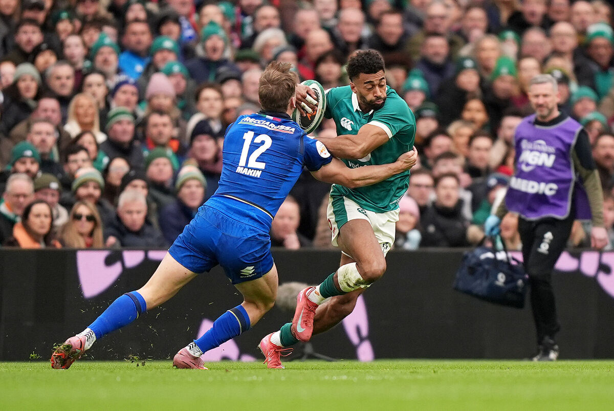 Ireland's Robert Baloucoune is tackled by Italy's Leonardo Marin during the Guinness Men's Six Nations match at the Aviva Stadium[Pic: Niall Carson/PA Wire.