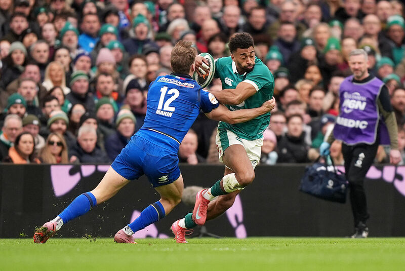 Ireland's Robert Baloucoune is tackled by Italy's Leonardo Marin during the Guinness Men's Six Nations match at the Aviva Stadium[Pic: Niall Carson/PA Wire. Ireland's Robert Baloucoune is tackled by Italy's Leonardo Marin during the Guinness Men's Six Nations match at the Aviva Stadium[Pic: Niall Carson/PA Wire.