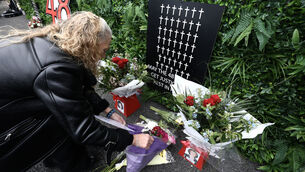 <p>Stardust activist and survivor Antoinette Keegan, who lost two sisters in the fire, lays flowers during the vigil. Picture: Leah Farrell/RollingNews.ie</p> <p>Stardust activist and survivor Antoinette Keegan, who lost two sisters in the fire, lays flowers during the vigil. Picture: Leah Farrell/RollingNews.ie</p>